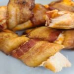 Bacon wrapped around chicken