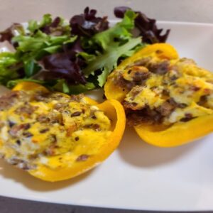 Breakfast Stuffed Peppers with a side salad of leafy greens