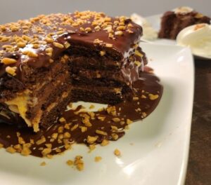 Layers of chocolate cake with caramel and toffee