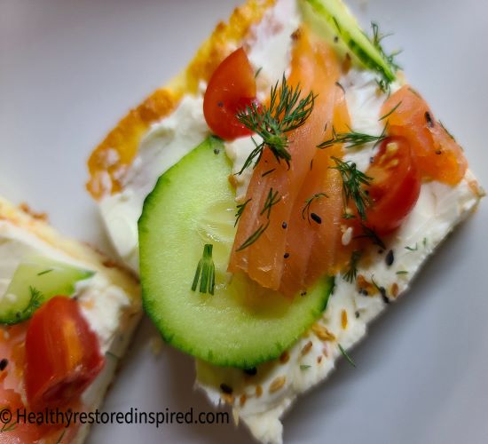 Everything bagel seasoning with smoked salmon on top of an almond flour crust